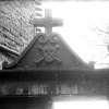 Detail of the cemetery gate installed by Saunière with skull and crossbones