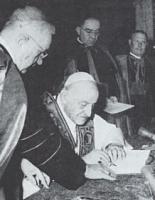 Pope John XXIII, signing the enciclica Pacem in Terris