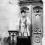 Saunière at the porch of his finished Church