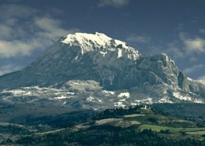 Mount Bugarach facing up to the sky with Rennes-le-Château in the foreground